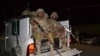 FILE - Pakistani troops are seen on a pick-up truck in Quetta, Baluchistan province, Pakistan, Oct. 25, 2016. 