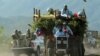 Pakistani paramilitary forces patrol on July 9, 2011 as displaced families flee the area during the "Koh-e Safid" (White Mountain) military operation against Taliban militants in central part of Kurram Agency, Pakistan's tribal belt bordering Afghanistan.