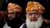 FILE - Maulana Fazal-ur-Rahman, right, pro-Taliban cleric and chief of religious party Jamiat Ulema-i-Islam addresses a news conference with Abdul Ghafoor Haidari in Islamabad, Pakistan, Feb. 3, 2014.