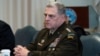 FILE - In this Sept. 22, 2020, file photo Joint Chiefs Chairman Gen. Mark Milley listens before a meeting at the Pentagon in Washington.