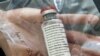 (FILES) In this file photo one vial of the drug Remdesivir is viewed during a press conference about the start of a study with the Ebola drug Remdesivir in particularly severely ill patients at the University Hospital Eppendorf (UKE) in Hamburg, northern 